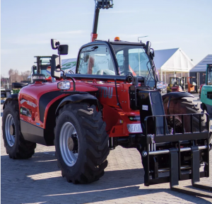 Русский Телескопический погрузчик Manitou MT933